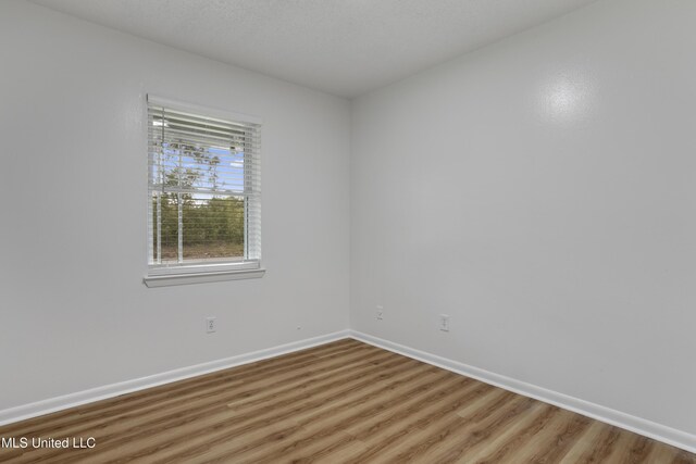 100 Grand Teton Dr, Ocean Springs, MS 39564 - unfurnished room featuring baseboards and light wood-style flooring