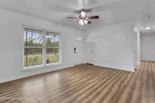 100 Grand Teton Dr, Ocean Springs, MS 39564 - interior space featuring light wood finished floors, baseboards, and ceiling fan