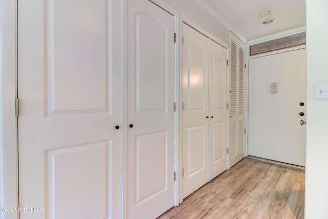 229 Lakeside Villa Unit E, Diamondhead, MS 39525 - corridor with light wood-style floors