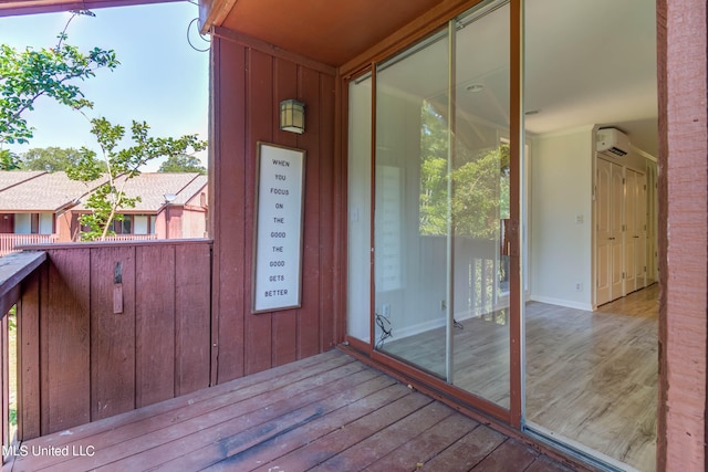 entrance to property with an AC wall unit