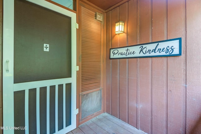 229 Lakeside Villa Unit E, Diamondhead, MS 39525 - doorway to property with board and batten siding
