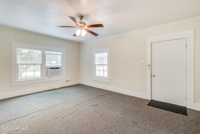 carpeted spare room with ceiling fan, ornamental molding, and cooling unit