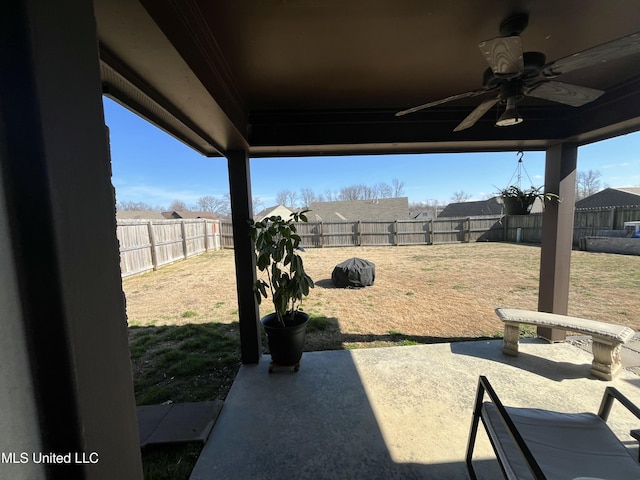 view of patio featuring a ceiling fan and a fenced backyard