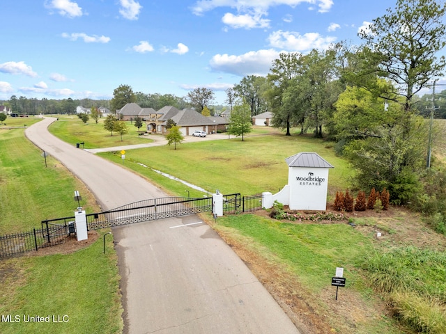 view of community with a lawn