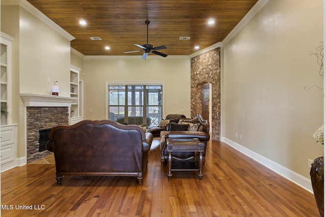 living room featuring a fireplace, wood ceiling, built in shelves, and dark hardwood / wood-style flooring