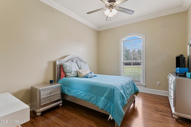 bedroom with ornamental molding, ceiling fan, and dark hardwood / wood-style flooring