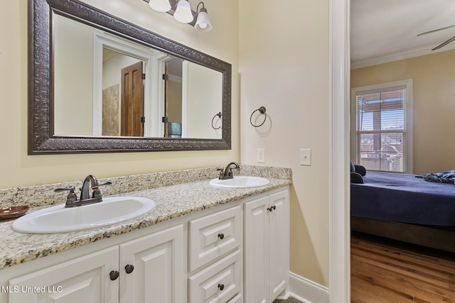 bathroom featuring vanity and hardwood / wood-style flooring