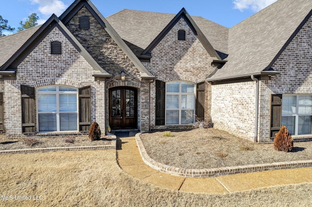 french country style house with french doors