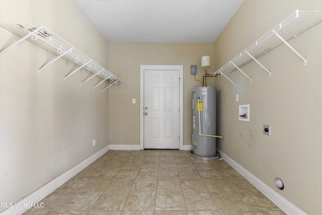 laundry area featuring washer hookup, light tile patterned flooring, electric water heater, and hookup for an electric dryer