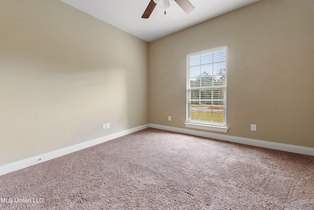 unfurnished room featuring carpet floors and ceiling fan