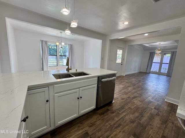 716 New Orleans St, Hattiesburg, MS 39401 - kitchen with stainless steel dishwasher, open floor plan, light stone counters, a chandelier, and recessed lighting