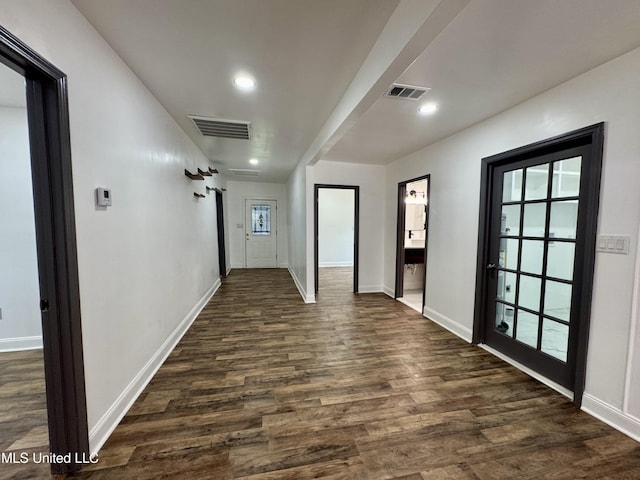 716 New Orleans St, Hattiesburg, MS 39401 - corridor with dark wood-style flooring, healthy amount of natural light, and recessed lighting
