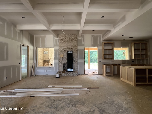 517 Central Cir, Brandon, MS 39047 - unfurnished living room with coffered ceiling and beam ceiling