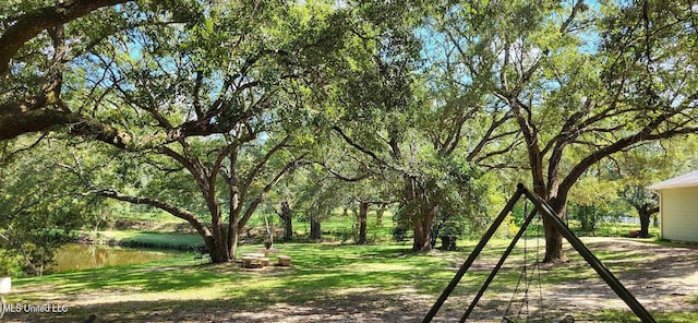 view of yard with a water view