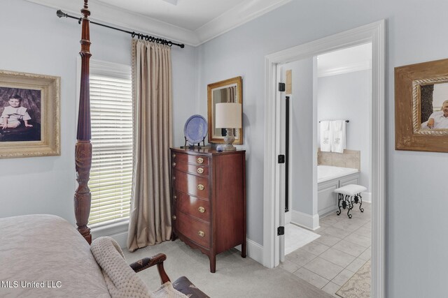 308 W Park St, Canton, MS 39046 - bedroom featuring light tile patterned floors, baseboards, ornamental molding, and ensuite bathroom