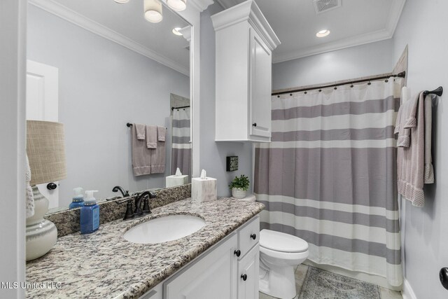 308 W Park St, Canton, MS 39046 - bathroom featuring vanity, ornamental molding, toilet, tile patterned flooring, and recessed lighting