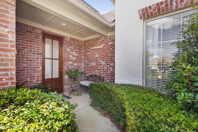 308 W Park St, Canton, MS 39046 - view of exterior entry with brick siding