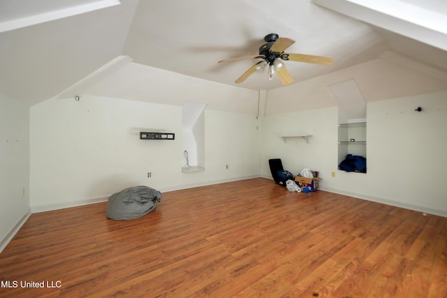 unfurnished living room with ceiling fan and hardwood / wood-style flooring