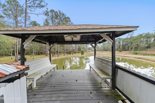 dock area with a gazebo and a water view