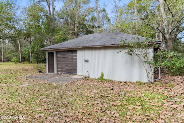 view of outdoor structure with a garage