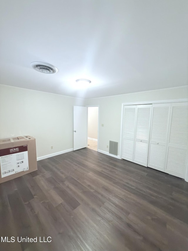 588 Robin Rd, Grenada, MS 38901 - interior space with dark wood-type flooring and a closet
