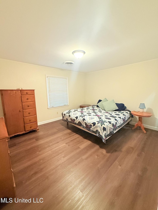 588 Robin Rd, Grenada, MS 38901 - bedroom with wood-type flooring