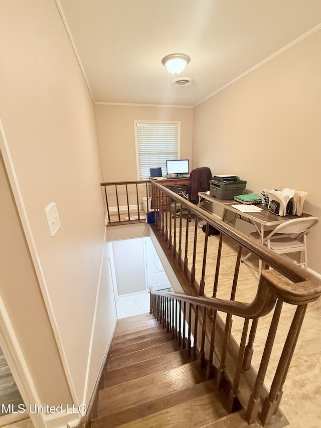 588 Robin Rd, Grenada, MS 38901 - staircase with wood-type flooring and crown molding
