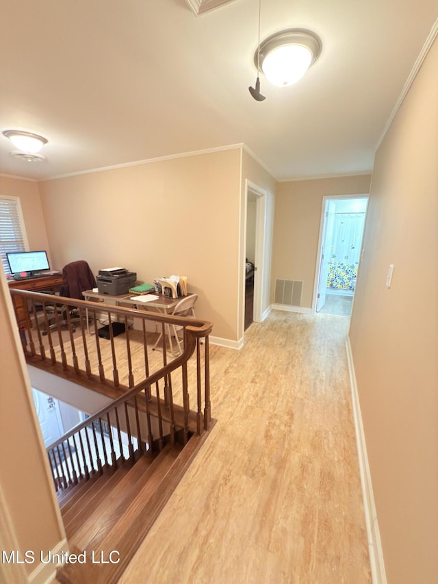 588 Robin Rd, Grenada, MS 38901 - corridor featuring hardwood / wood-style flooring and ornamental molding