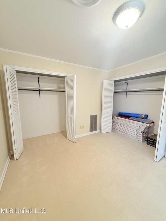 588 Robin Rd, Grenada, MS 38901 - unfurnished bedroom with crown molding and carpet flooring