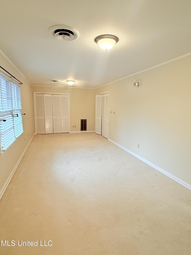 588 Robin Rd, Grenada, MS 38901 - carpeted spare room with ornamental molding