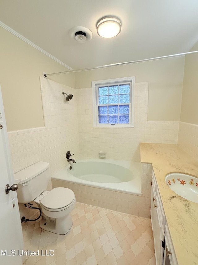 588 Robin Rd, Grenada, MS 38901 - full bathroom with toilet, tiled shower / bath, tile walls, ornamental molding, and vanity