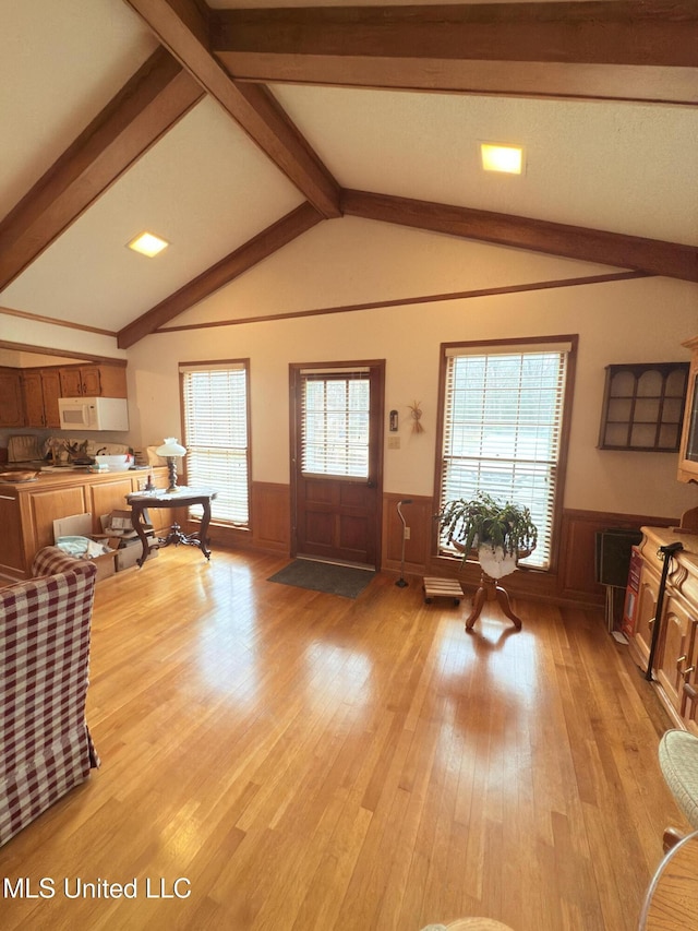 588 Robin Rd, Grenada, MS 38901 - living room featuring plenty of natural light, light hardwood / wood-style floors, and lofted ceiling with beams
