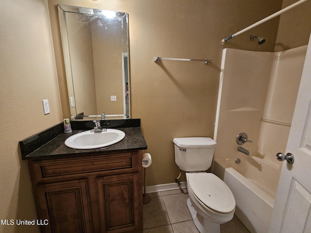 full bathroom with toilet, vanity, tile patterned floors, and tub / shower combination