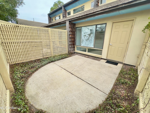 view of patio with fence