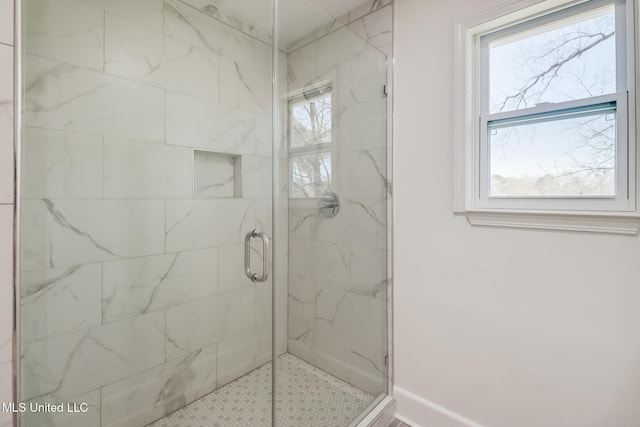 full bathroom with a shower stall