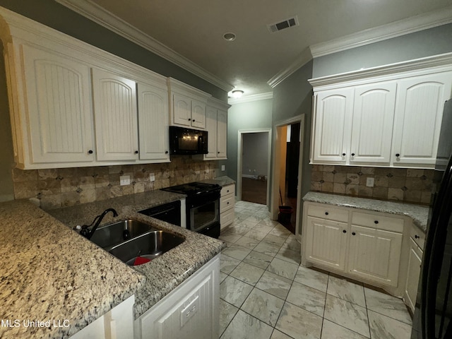 kitchen featuring white cabinetry, sink, ornamental molding, black appliances, and light stone countertops