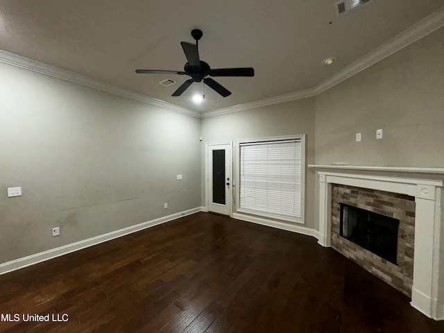 unfurnished living room featuring dark hardwood / wood-style flooring, ornamental molding, and ceiling fan