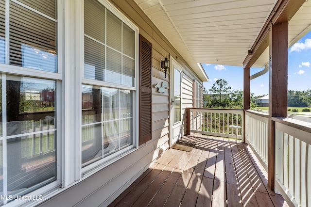 balcony featuring covered porch