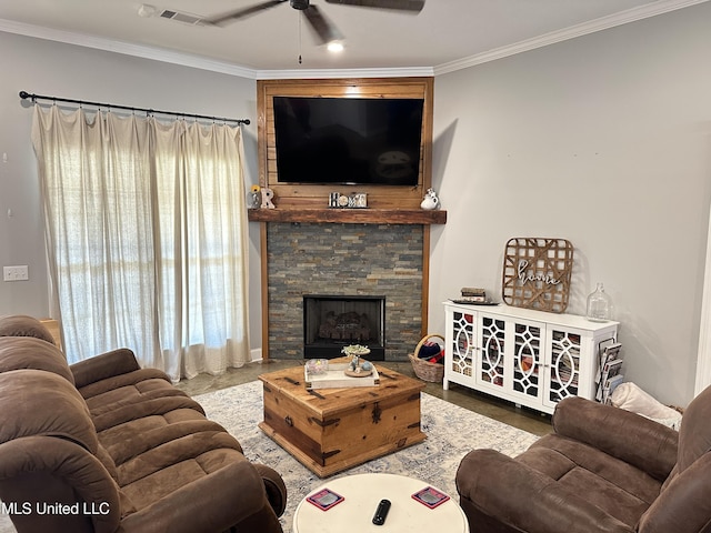 living room with ceiling fan, a fireplace, and ornamental molding