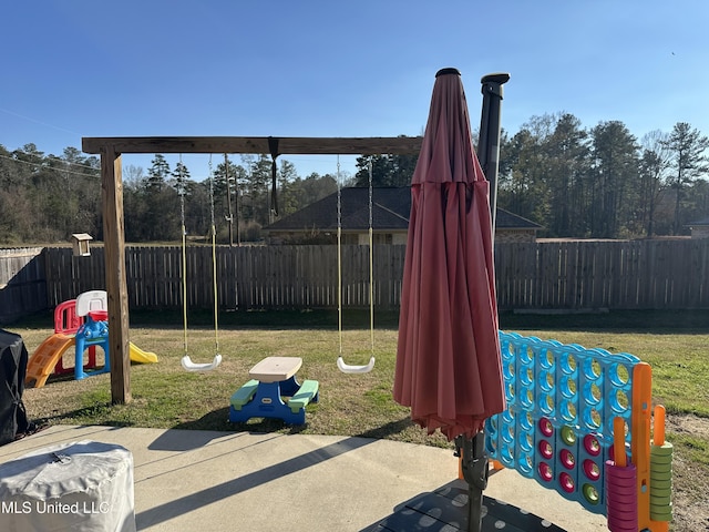 exterior space with a patio area and a lawn