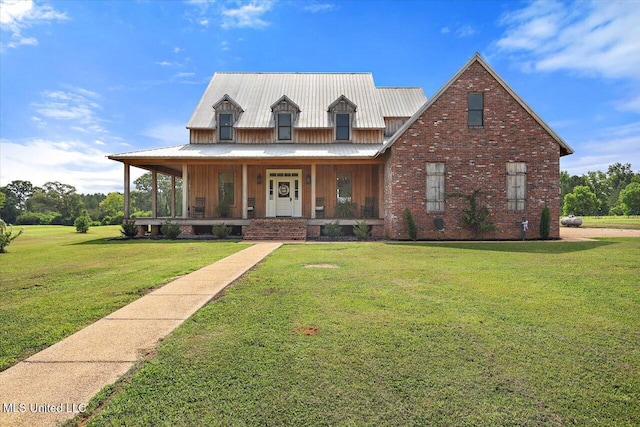 849 Athens Rd, Mendenhall, MS 39114 - view of front of property with a porch, a front lawn, brick siding, and board and batten siding