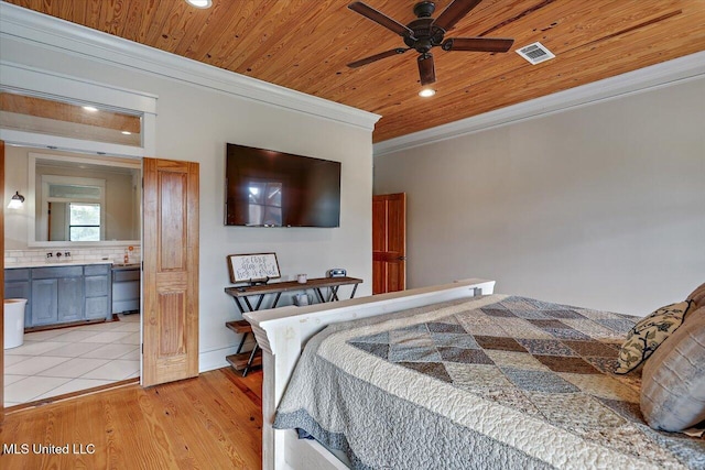849 Athens Rd, Mendenhall, MS 39114 - bedroom with crown molding, wood ceiling, recessed lighting, light wood-type flooring, and ensuite bath