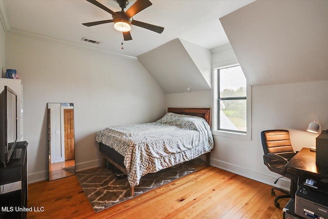 849 Athens Rd, Mendenhall, MS 39114 - bedroom featuring hardwood / wood-style flooring, a desk, a ceiling fan, vaulted ceiling, and ornamental molding