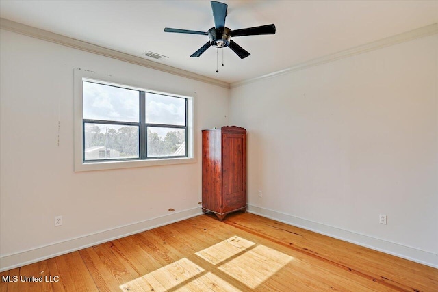849 Athens Rd, Mendenhall, MS 39114 - spare room with light wood-type flooring, ornamental molding, and ceiling fan