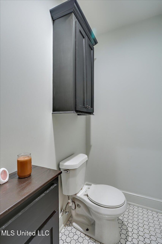 849 Athens Rd, Mendenhall, MS 39114 - bathroom featuring toilet and baseboards