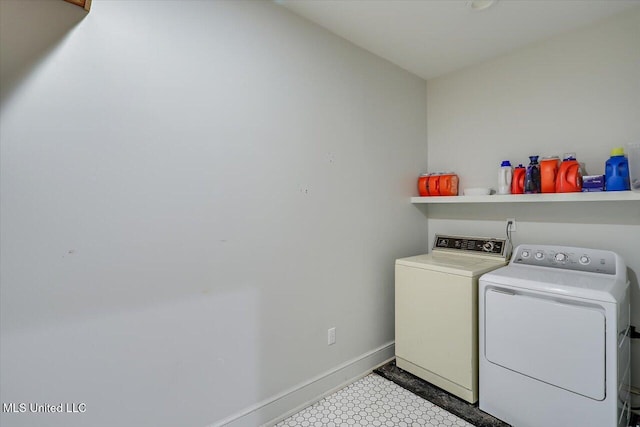 849 Athens Rd, Mendenhall, MS 39114 - washroom with washer and clothes dryer and baseboards
