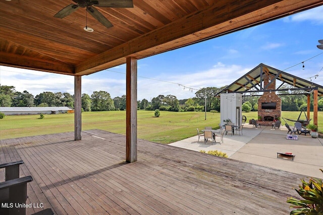 849 Athens Rd, Mendenhall, MS 39114 - wooden terrace featuring an outdoor brick fireplace, a yard, a ceiling fan, a gazebo, and a patio