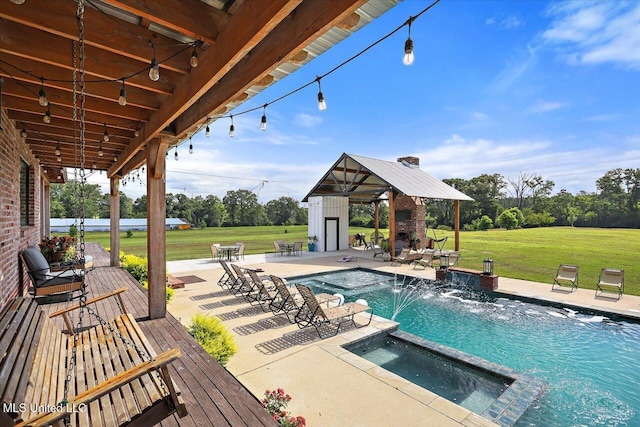 849 Athens Rd, Mendenhall, MS 39114 - view of swimming pool with a lawn, a patio, a pool with connected hot tub, and view of scattered trees