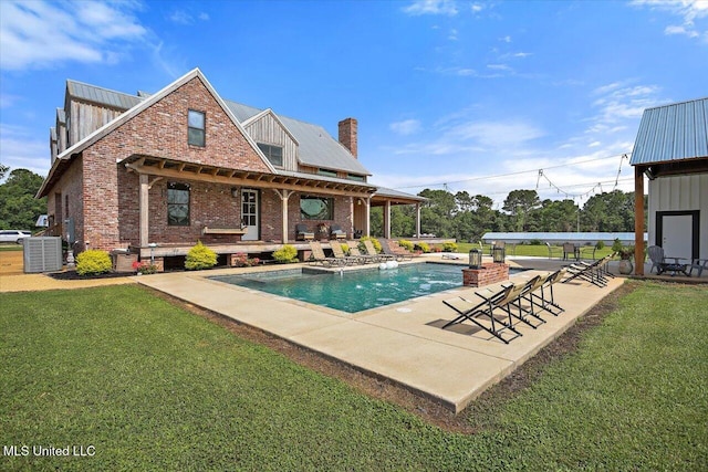 849 Athens Rd, Mendenhall, MS 39114 - outdoor pool with a patio and a yard
