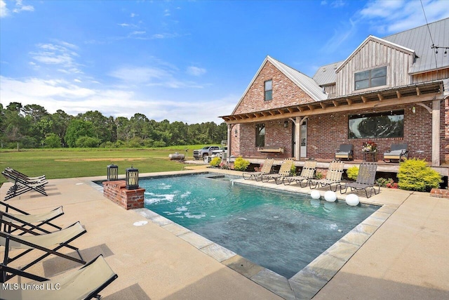 849 Athens Rd, Mendenhall, MS 39114 - swimming pool with a patio area and a yard